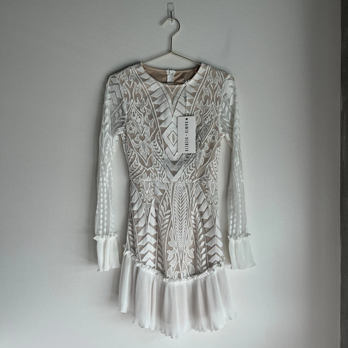 Saints and top secrets white dress