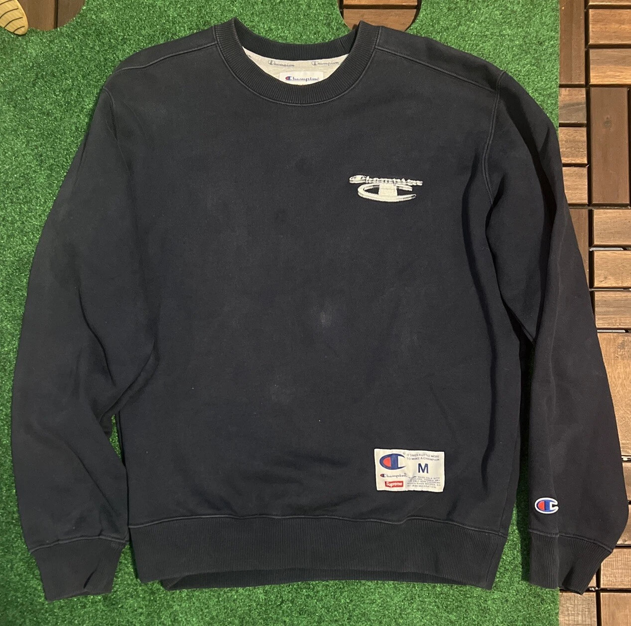 Col rond métallisé Supreme Champion 3D bleu marine taille M