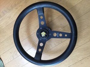 Vintage MOMO steering wheel, 35 diameter, rare, leather-wrapped.
