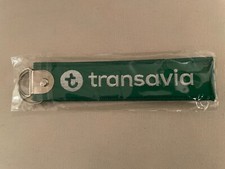 Porte clé brodé Transavia airlines vert/ Remove before flight aviation collector