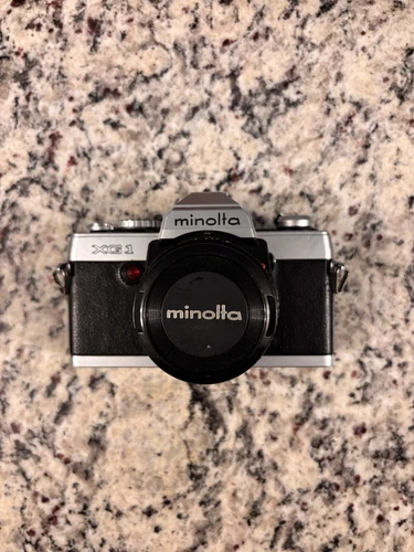 LOT: Minolta XG-1 SLR 45 mm film camera, lenses, strap, manual: TESTED WORKS!
