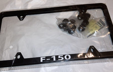 Paquete de 2 marcos de matrícula de metal negro para Ford F-150 F 150 letras blancas NUEVO