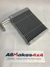 Allmakes OE Land Rover Defender Heater Matrix Early Type Curved Downward Pipes
