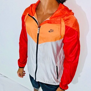 red and orange nike windbreaker