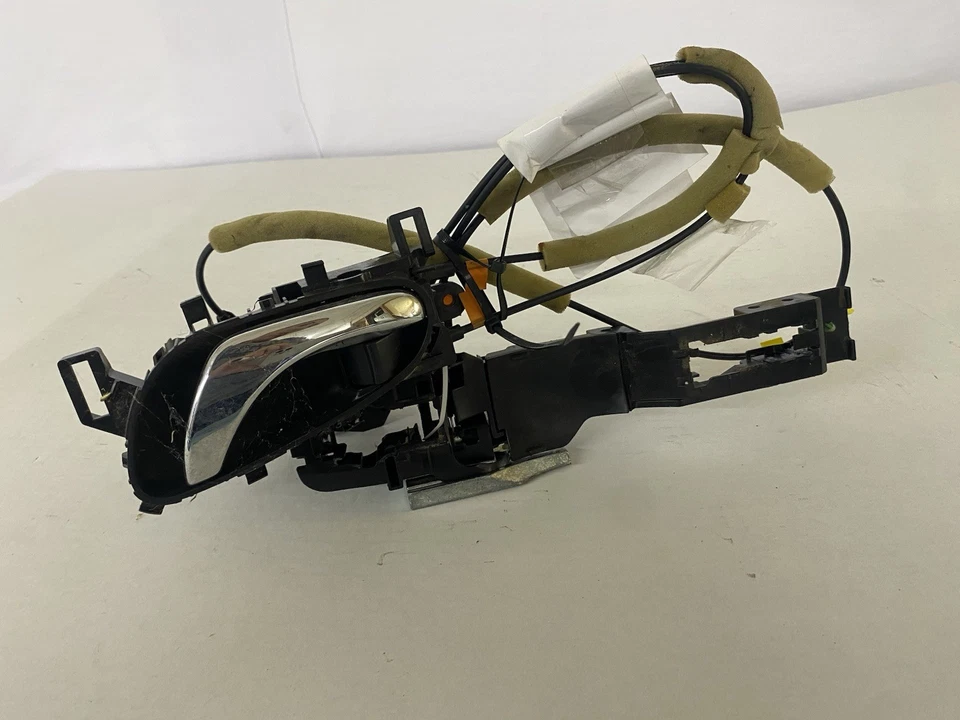 Nissan Sentra 2016-2019 manija de puerta interior delantera izquierda conductor OEM 82501-9AN0A Foto 2 de 4