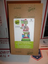 JIM SHORE DR SEUSS THE GRINCH HOLDING PRESENTS 8 INCH  FIGURINE  ENESCO