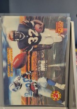 1995 Sportflix - Man 2 Man Barry Sanders, Ki-Jana Carter #5 (RC)