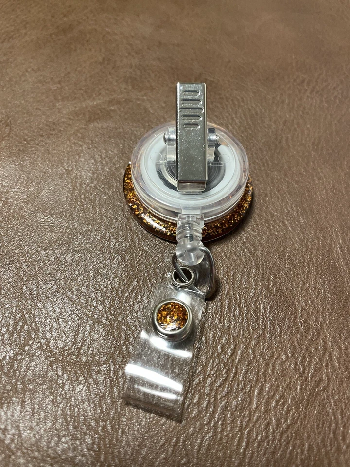 Carrete de insignia retráctil de calabaza de otoño brillante Foto 2 de 3