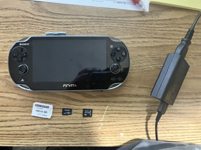 PS Vita 1000 OLED Black w/ 8GB MemCard, SD2VITA & 64 GB MicroSD card BUNDLE SET