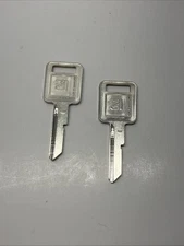 2 Vintage GM 1970s 1980s auto key blanks (E) stamp rare General Motors cars NOS