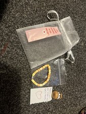 Orange And Yellow Braclet Comes With A Smores Scwishmallow 