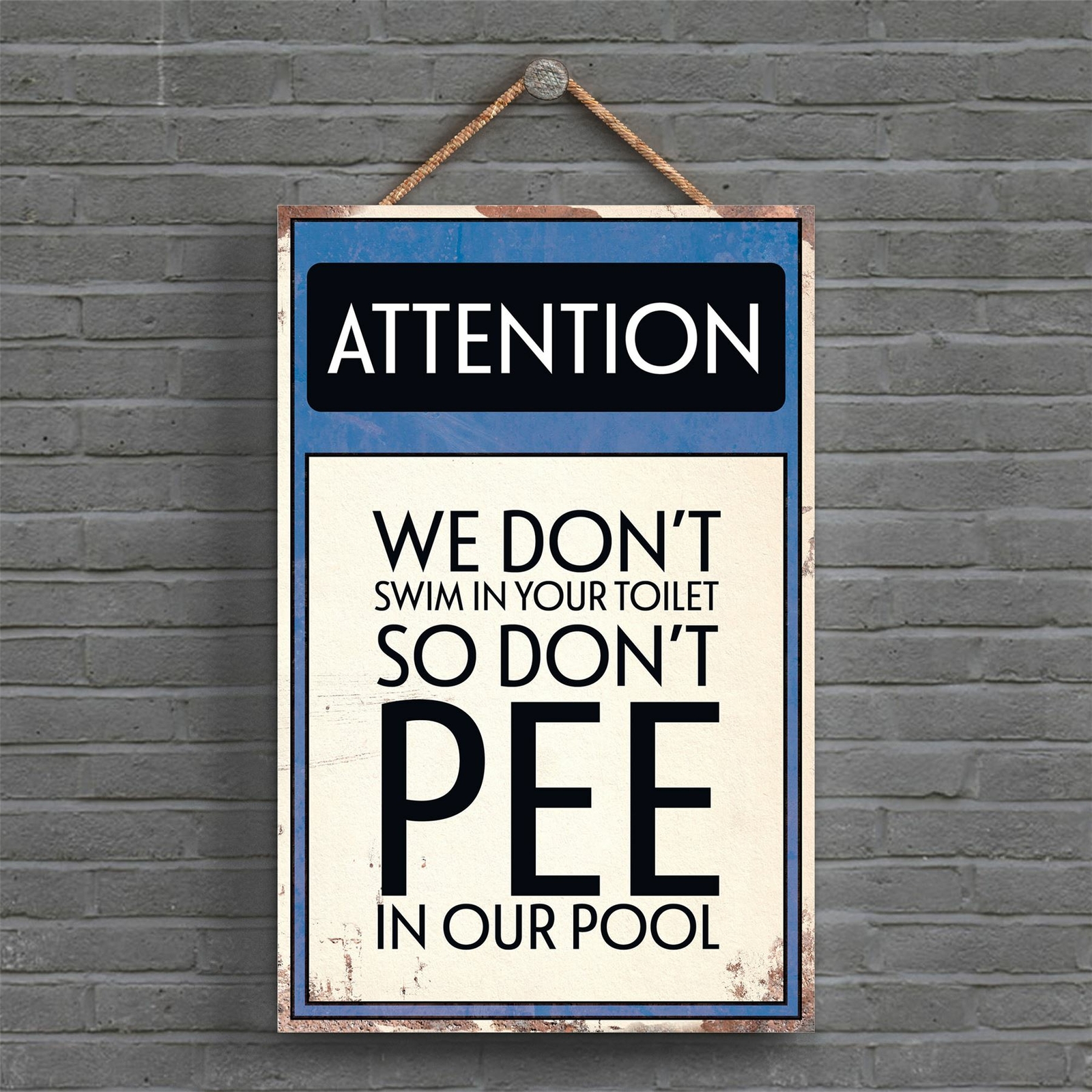 ATTENTION DON'T PEE TYPOGRAPHY SIGN PRINTED ONTO A WOODEN HANGING PLAQUE