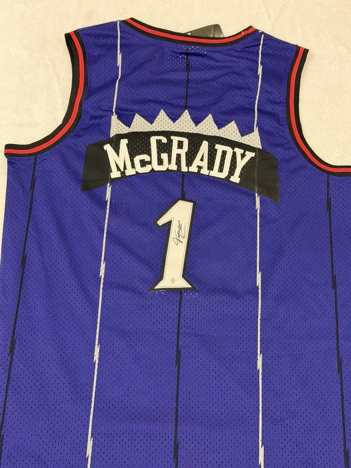 Camiseta deportiva de baloncesto firmada por Tracy McGrady de los Toronto Raptors de la NBA certificado de autenticidad Foto 3 de 4