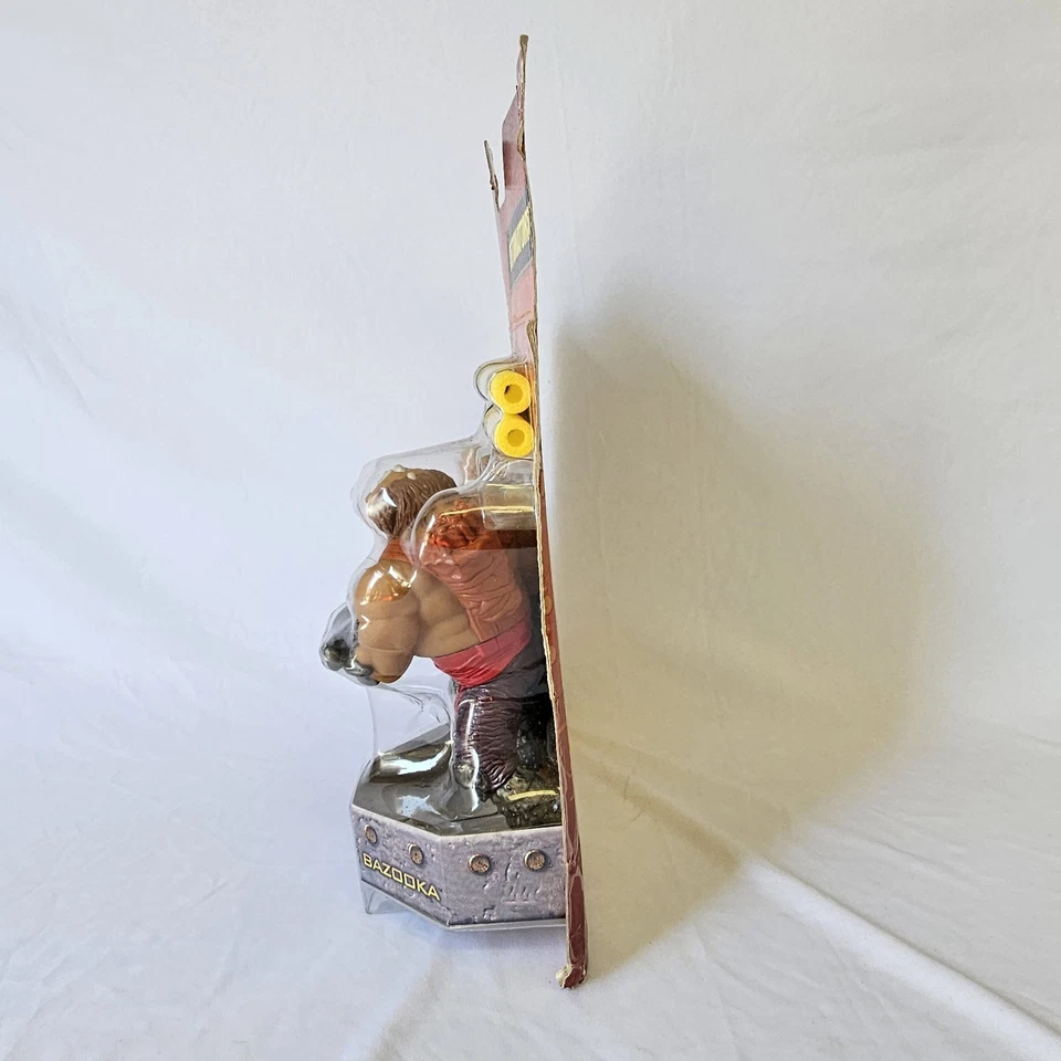 Boneco de ação Kenner Small Soldiers Detonators Archer VS Brick Bazooka 1998 novo na caixa - Imagem 4 de 4