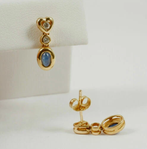 Orecchini con diamanti pendenti in oro giallo