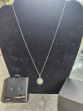 Diamond cluster necklace. NWT. sterling silver 1/10th carat