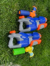 Water guns - 2 Super Soaker Helix and 2 Hydro...