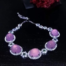 Ensemble bague, boucle d'oreille, pendentif, bracelet quatre pièces calcédoine rose agate