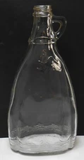 Vintage Anheuser Busch pancake syrup bottle, 9.5" tall clear glass WW II era.