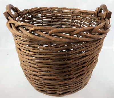 A Vintage Wicker Laundry Basket A Vintage Wicker Laundry Basket