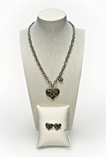 Collana e orecchini Guess leopardo oro e cuore nero cuore San Valentino amore