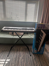 Casio CTK-1200 61-Key Electronic Keyboard, Built-in Speaker, Stand & Books