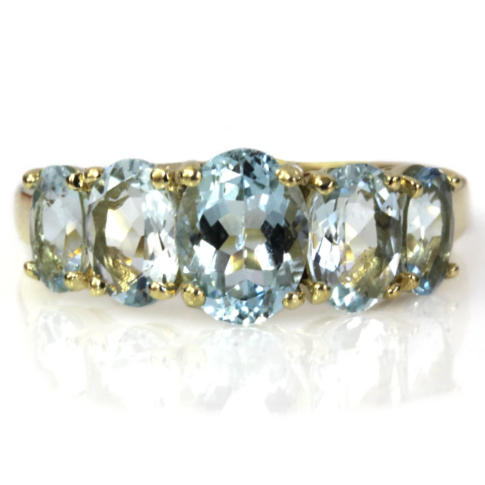 Anillo graduado de cinco piedras de oro amarillo sólido de 14 k aguamarina azul natural de 3 quilates Foto 3 de 4