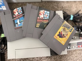 Nintendo NES Bundle W/ controllers, Cables And 4 Games