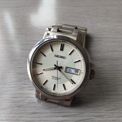 seiko titanium day date watch