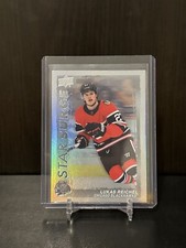 2023-24 Upper Deck Series 1 Star Surge SS-16 Lukas Reichel Rc Chicago Blackhawks