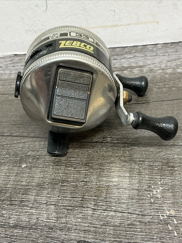CARRETE SPINCASTING CARA CERRADA RESISTENTE RINOCERONTE ZEBCO #33 HECHO EN EE. UU.🐠 Foto 3 de 4