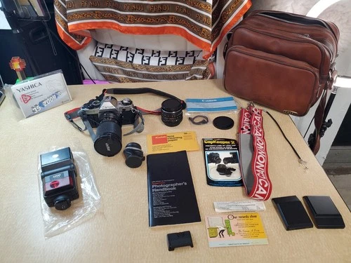 Canon A-1 Program 35mm Camera With Lenses, Manual And Bag & MORE