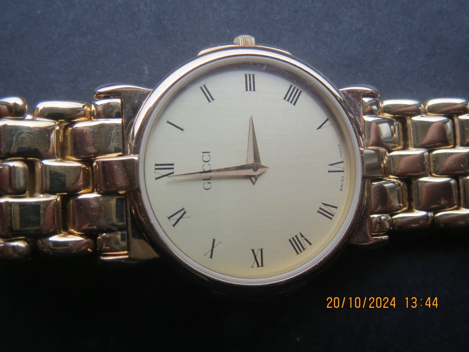 Montre Gucci plaqué or 18 carats bracelet Gucci montre suisse modèle 3400/3700 en boite