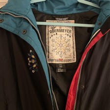 Obermeyer Black Embroidered Ski 1947 Thermolite Hooded Jacket Sz10 Zip Front
