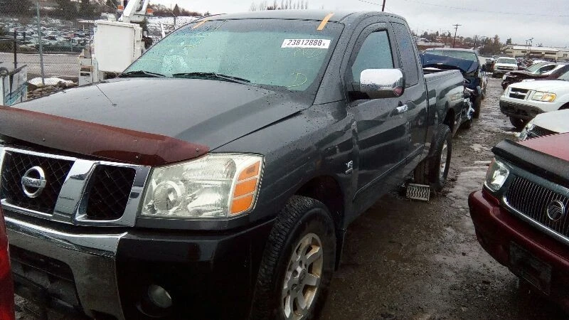 Luz de neblina esquerda para motorista de 2004 Nissan Titan 5106077 - Imagem 3 de 4