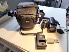 Canon Powershot SX40 HS digital camera and video recorder with 32 GB SD card