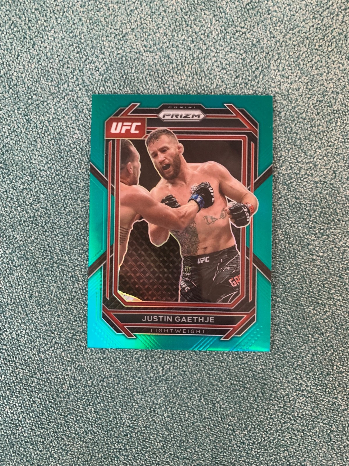 2023 Panini Prizm UFC Prizms Teal #110 Justin Gaethje /49