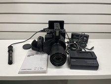 Sony NEX-FS700RH 4K Super 35mm NXCAM Kit with SELP18200 18-200mm Lens Bundle