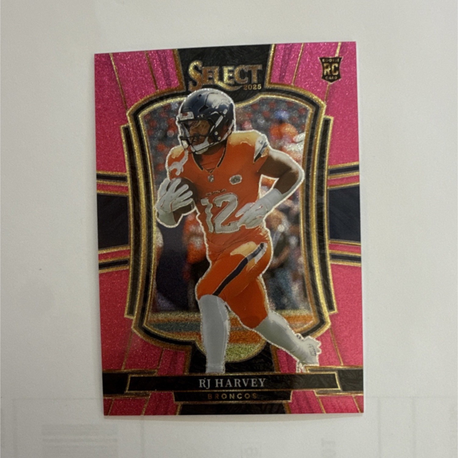 2025 Panini Select RJ Harvey Broncos #110 Premier Pink Glitter Prizm Rookie /15