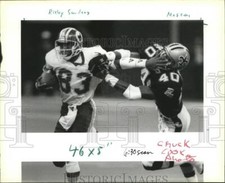 1989 Press Photo Ricky Sanders New Orleans Saints Tackling Opponent - noa00977