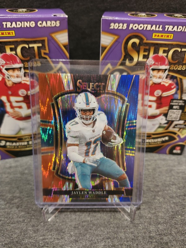 2025 Panini Select - Premier Level Red & Blue Shock Prizm Jaylen Waddle #182