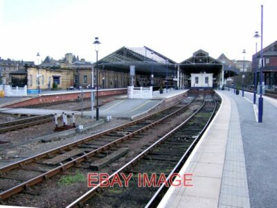 PHOTO  AN UNUSUALLY QUIET HUDDERSFIELD STATION IT USUALLY MUCH BUSIER THAN THIS