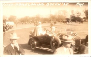 Vintage RPPC postcard 1928 Homecoming Queen Riding in Old Car