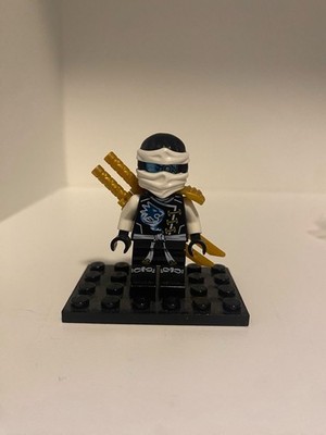 LEGO Ninjago Minifigur - Zane Skybound (njo0189) mit Waffen - TOP Zustand
