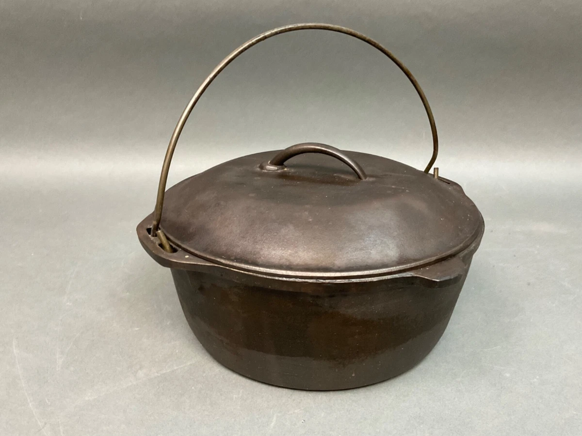 Vintage Cast Iron Lodge number (8) DO Dutch Oven was made in the