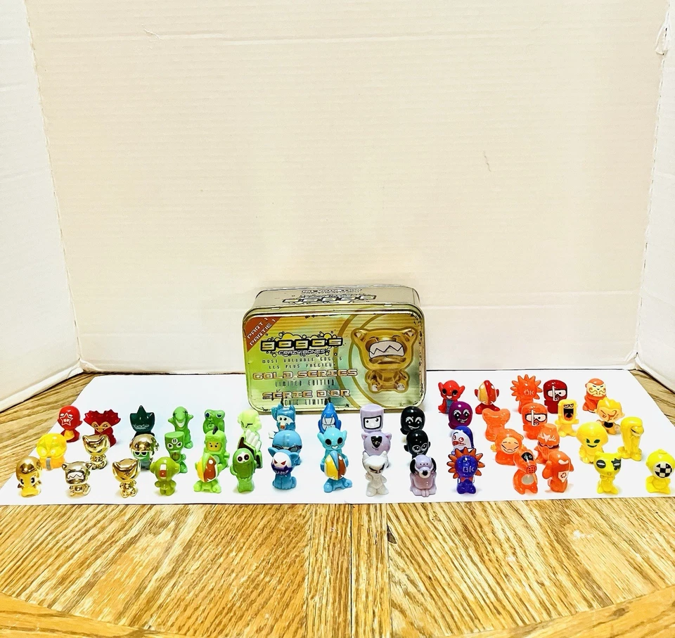 Gogo’s Crazy Bones Gold Series 1 Tin With 50 Figures Some Rare Read JDNA 2010 - Image 2 of 4