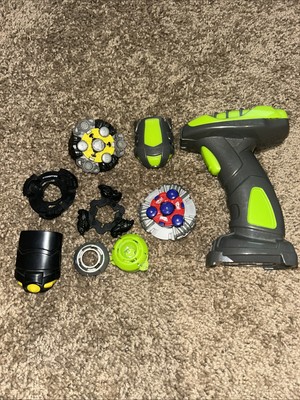 Beyblade Launcher And Wheels Lot Various Pieces Green And Black Toys 