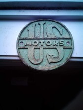 Vintage 1950s US Motors Emblem Cast Sign Plaque Small