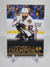 2025-26 Chicago Blackhawks Centennial Johnny Oduya Capturing a Champion Gold