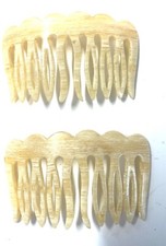 10.193 Vintage combs, carved celluloid, France